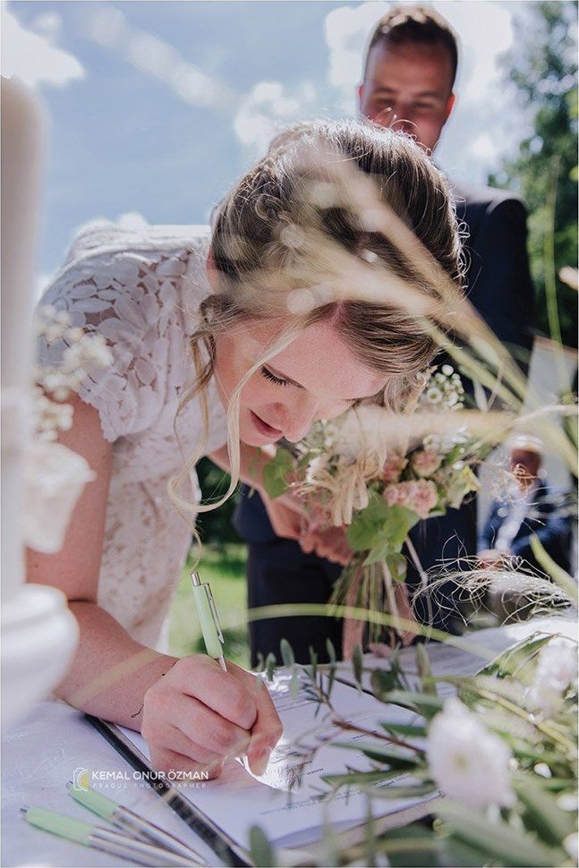 Bride signing the marriage register